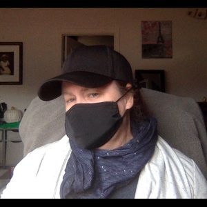 Black ponytail cap with attached mask